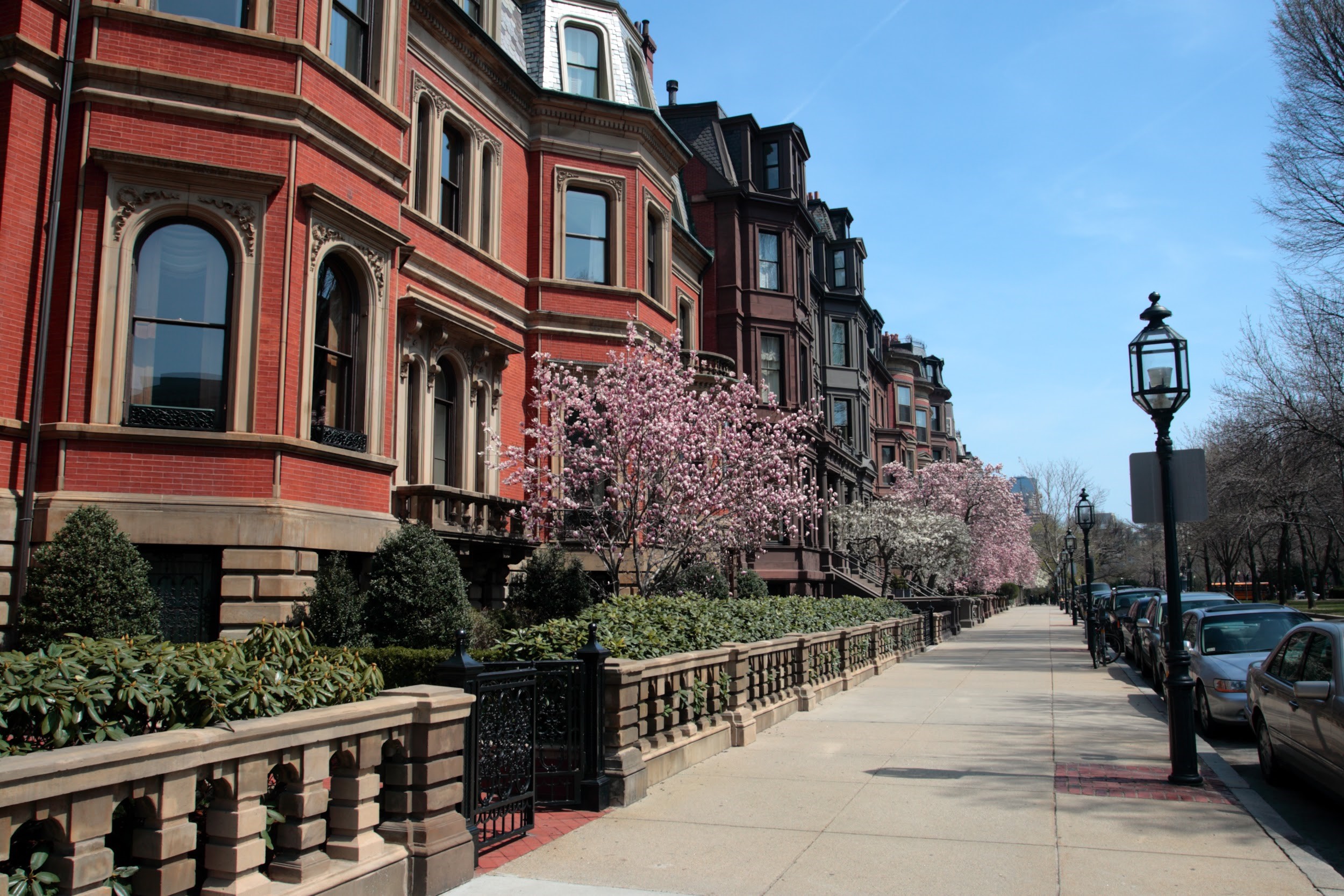 Sprawling row of traditional residential brownstones in Beacon Hill Boston, Massachusetts.